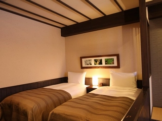 ■クラシック(和洋室)■畳の上でも寛げる、32㎡。窓からは大雪山国立公園の原生林がご覧いただけます。