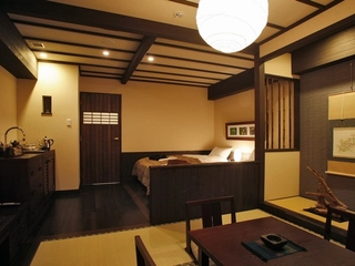 ■クラシック(和洋室)■畳の上でも寛げる、32㎡。窓からは大雪山国立公園の原生林がご覧いただけます。