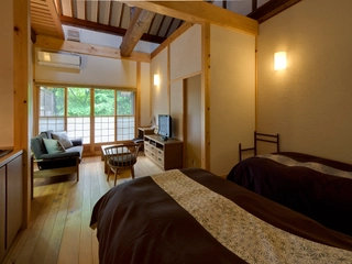 【露天風呂付客室：姫子松の抄】広々とした洋室リビング一例。