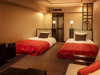 【デラックスツイン/33㎡】ベッドサイズ:2,000mm×1,200mm 2台、和布団 1組/最大定員3名様