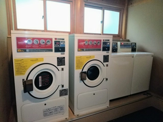 【コインランドリー】大浴場湯上り処にご用意しております。