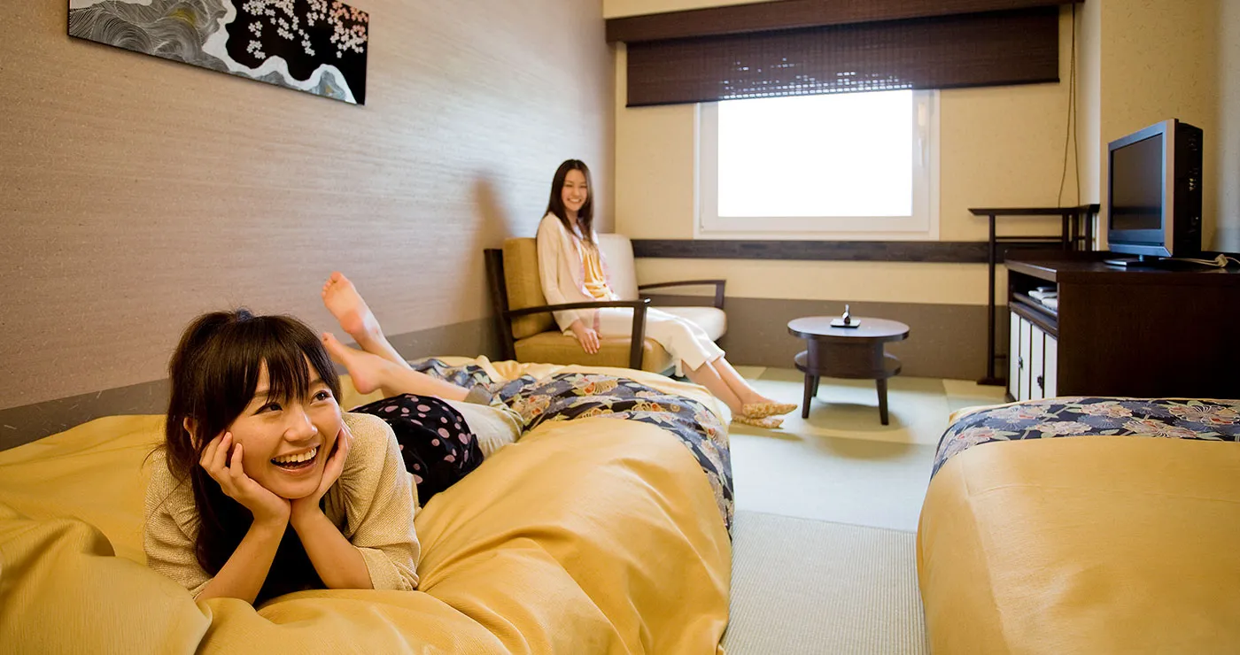写真: 「和」ツイン 和ベッドのある客室利用イメージ